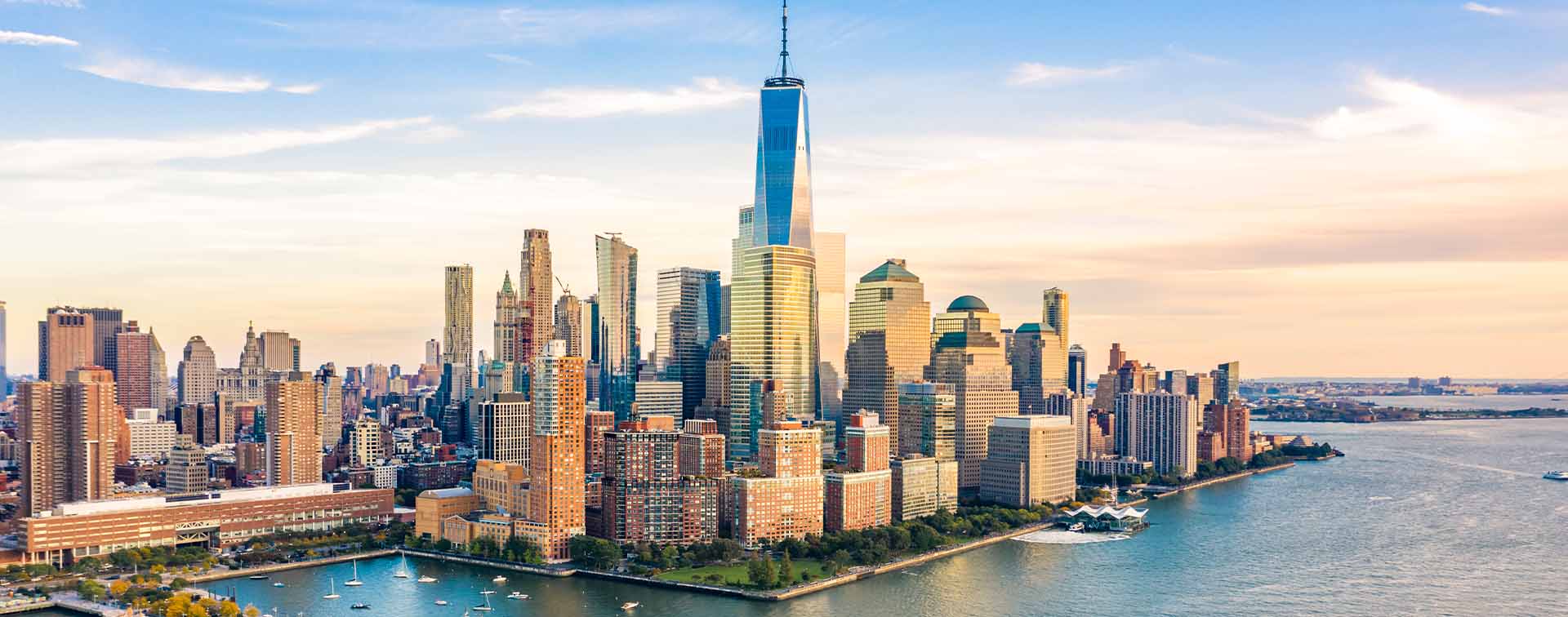 Aerial view of Lower Manhattan skyscrapers at a waterfront