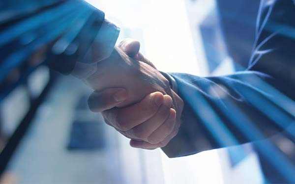 Businessmen making handshake with partner, greeting, dealing, merger and acquisition